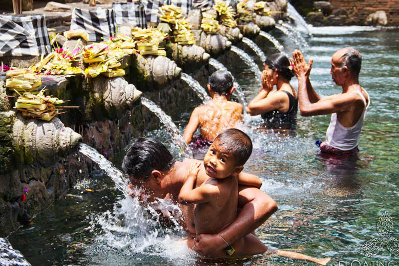 Kid looking at the camera while purification